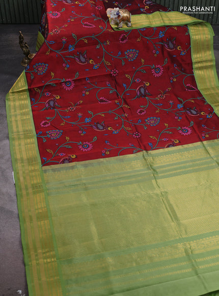 Silk cotton saree maroon and light green with allover kalamakri prints and zari woven korvai border