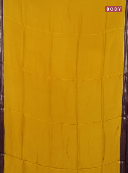 Art mysore silk saree yellow and deep jamun with plain body and zari woven border