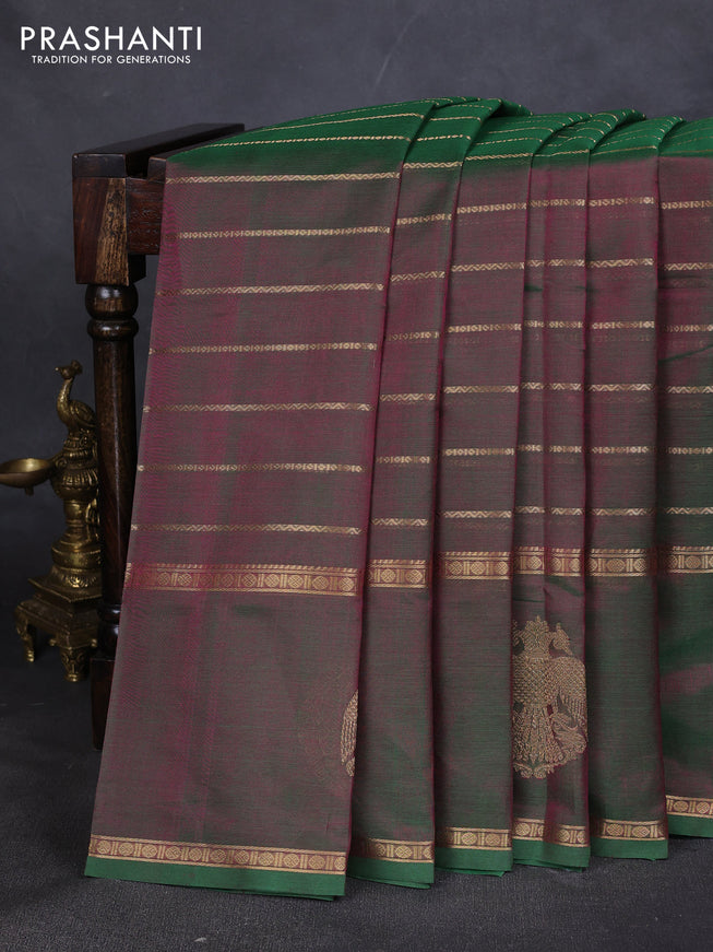 Kanchipuram silk cotton saree dual shade of green with allover zari stripes pattern and rettapet zari woven butta border