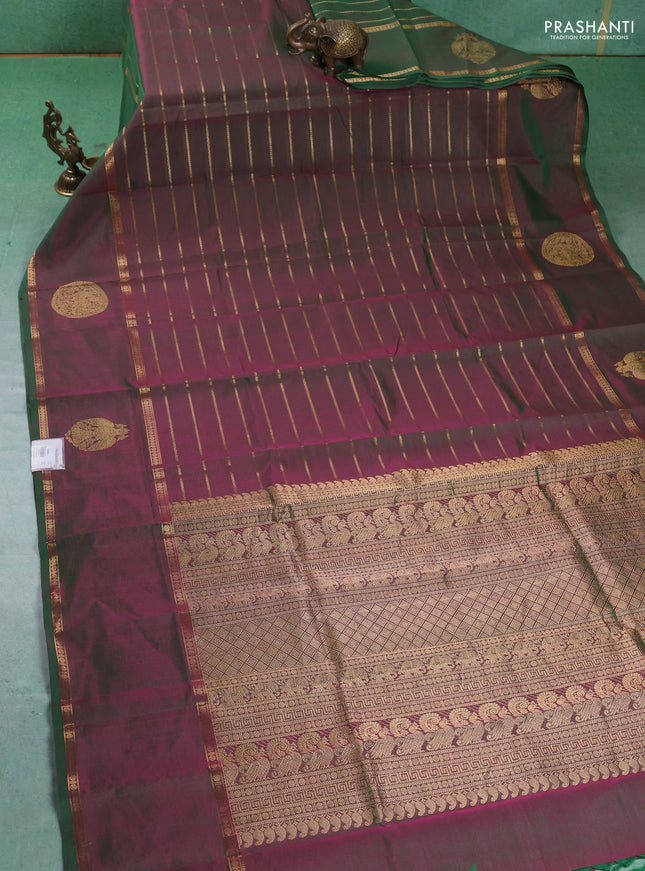 Kanchipuram silk cotton saree dual shade of green with allover zari stripes pattern and rettapet zari woven butta border