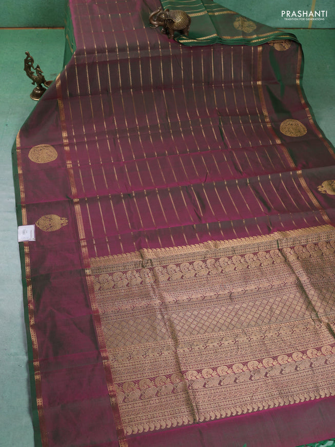 Kanchipuram silk cotton saree dual shade of green with allover zari stripes pattern and rettapet zari woven butta border