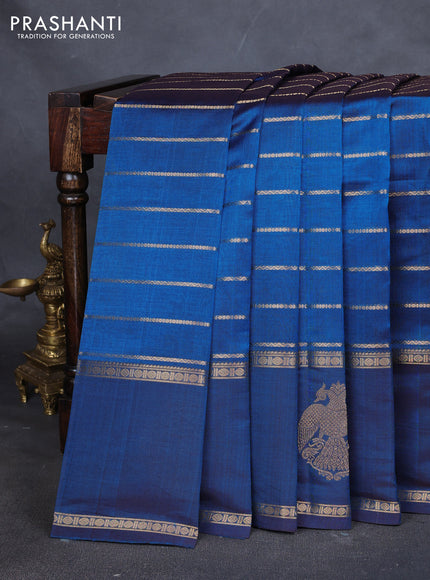 Kanchipuram silk cotton saree cs blue with allover zari stripes pattern and rettapet zari woven butta border