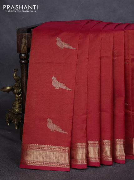 Kanchipuram silk cotton saree orange and and zari woven buttas and zari woven border