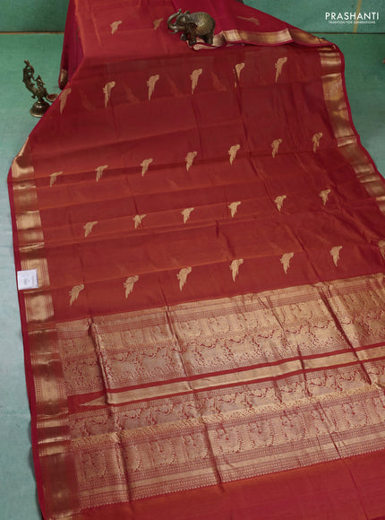 Kanchipuram silk cotton saree orange and and zari woven buttas and zari woven border