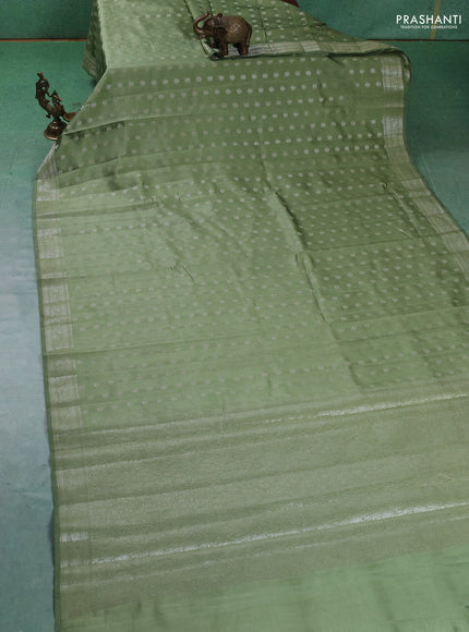 Chiniya silk saree pastel green with zari woven buttas and zari woven border