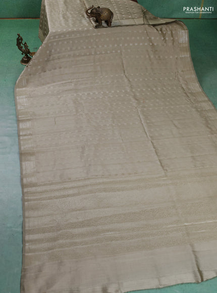 Chiniya silk saree elaichi green with zari woven buttas and zari woven border