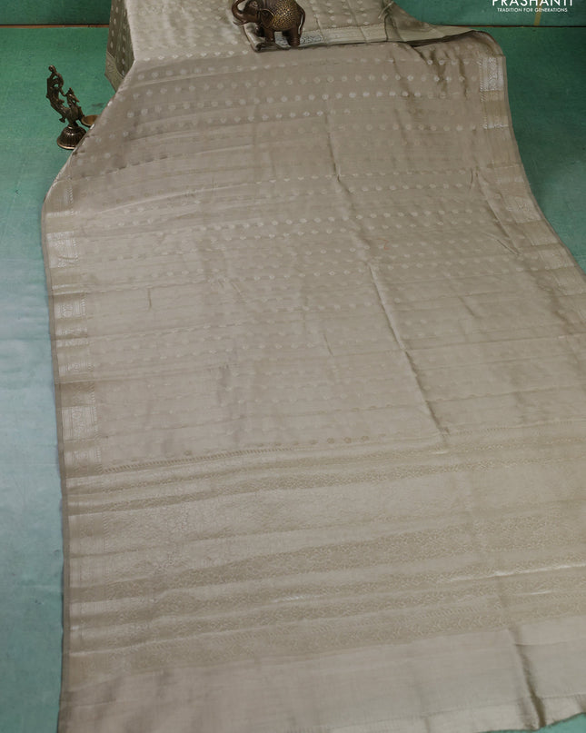 Chiniya silk saree elaichi green with zari woven buttas and zari woven border