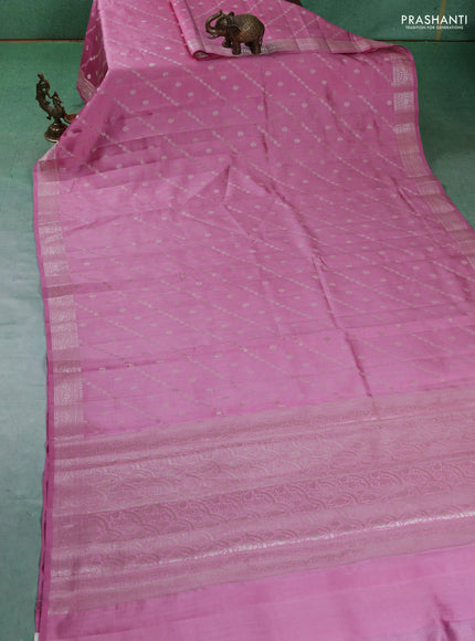 Chiniya silk saree light pink with allover silver zari weaves and zari woven border