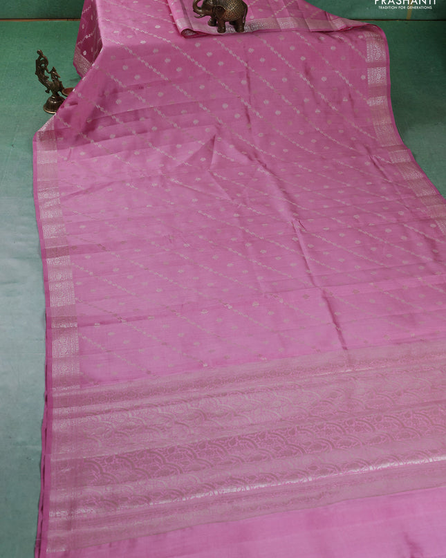 Chiniya silk saree light pink with allover silver zari weaves and zari woven border