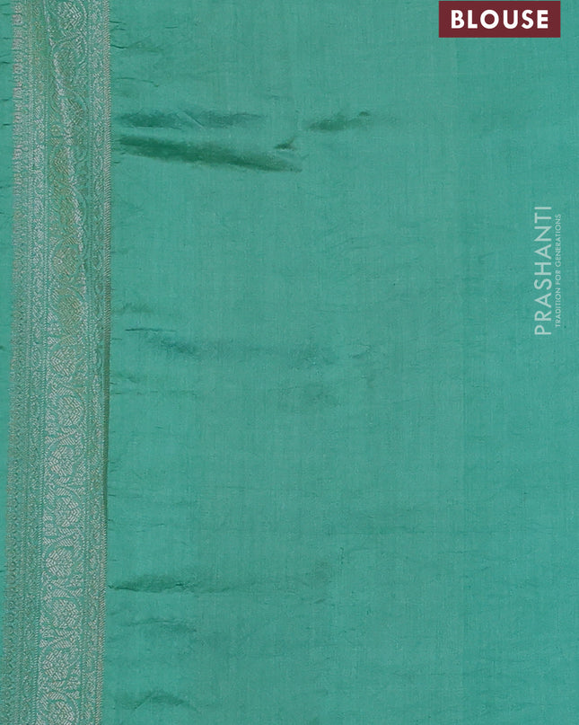 Chiniya silk saree teal green shade with allover silver zari weaves and zari woven border