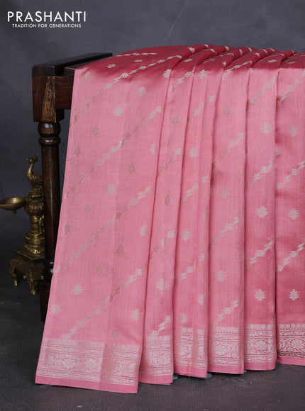 Chiniya silk saree peach shade with allover silver zari weaves and zari woven border