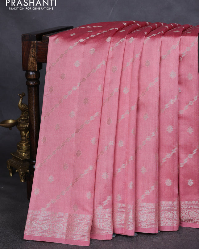 Chiniya silk saree peach shade with allover silver zari weaves and zari woven border