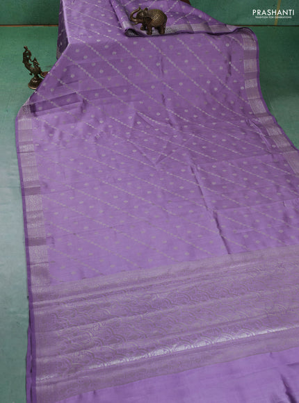 Chiniya silk saree lavender with allover silver zari weaves and zari woven border