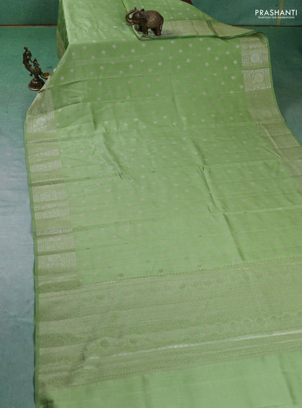 Chiniya silk saree pista green with zari woven buttas and zari woven border