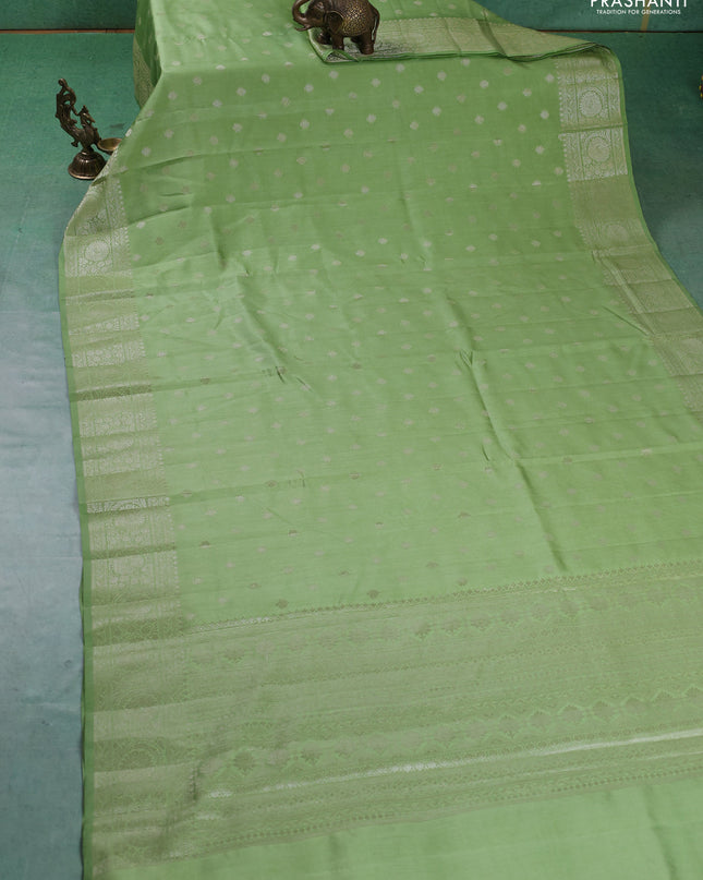 Chiniya silk saree pista green with zari woven buttas and zari woven border