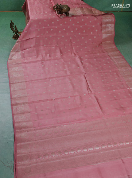 Chiniya silk saree peach shade with zari woven buttas and zari woven border