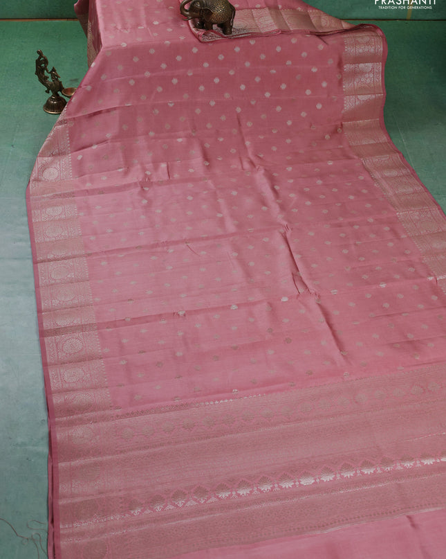 Chiniya silk saree peach shade with zari woven buttas and zari woven border