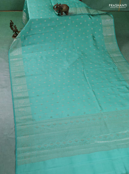 Chiniya silk saree pastel green with zari woven buttas and zari woven border