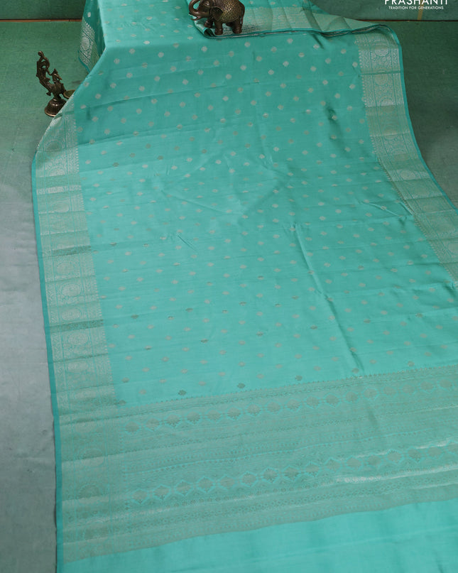 Chiniya silk saree pastel green with zari woven buttas and zari woven border