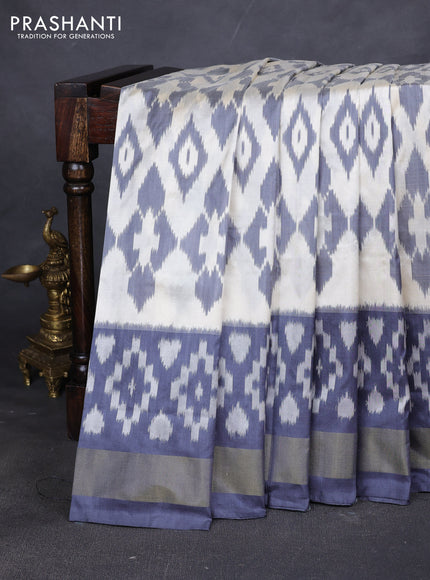 Pure pochampally silk saree grey and off white with allover geometric weaves and zari woven border