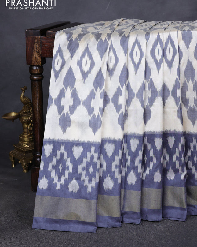 Pure pochampally silk saree grey and off white with allover geometric weaves and zari woven border