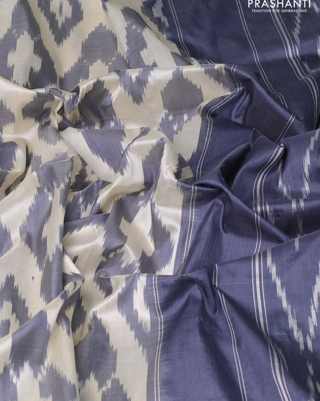 Pure pochampally silk saree grey and off white with allover geometric weaves and zari woven border
