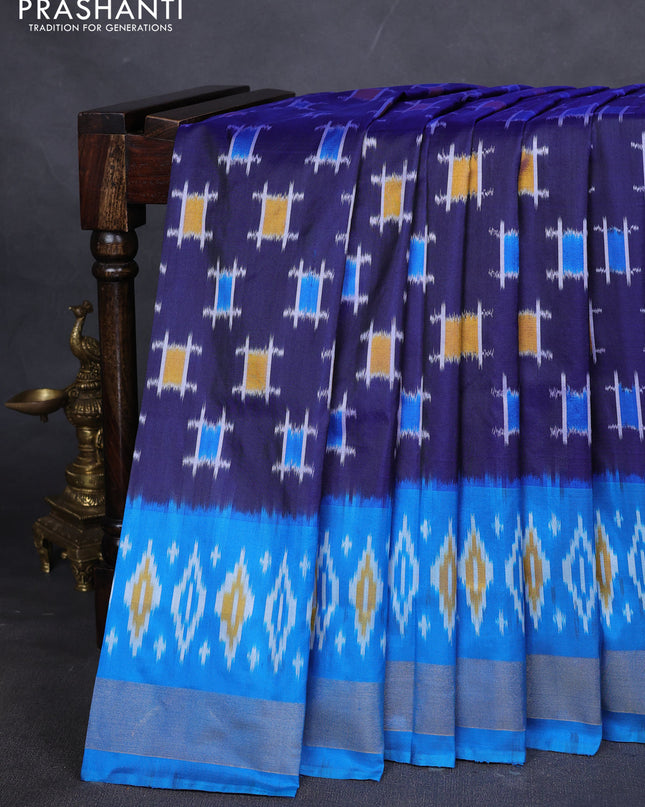 Pure pochampally silk saree navy blue and cs blue with ikat butta weaves and zari woven simple border