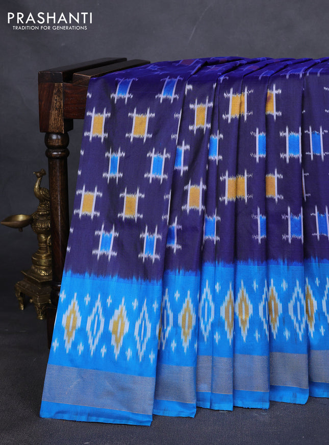 Pure pochampally silk saree navy blue and cs blue with ikat butta weaves and zari woven simple border