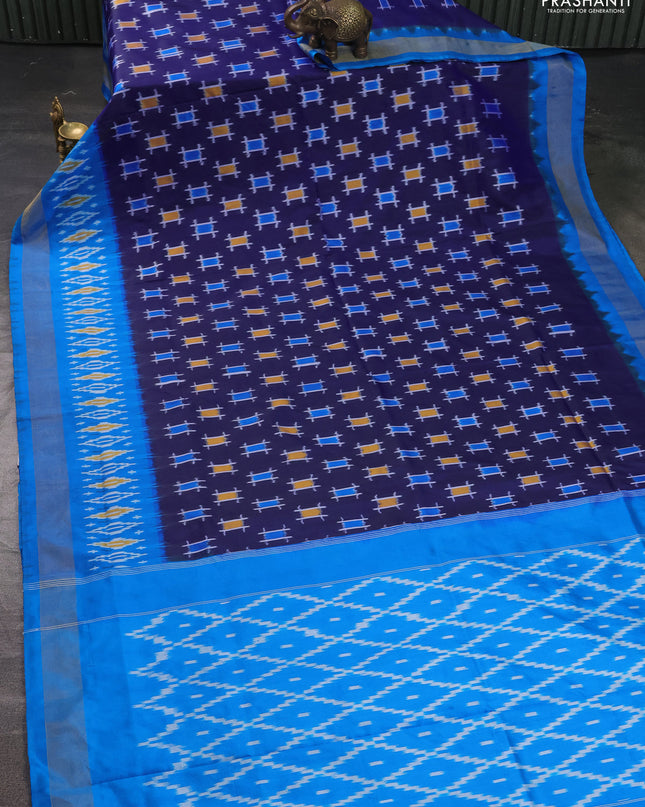 Pure pochampally silk saree navy blue and cs blue with ikat butta weaves and zari woven simple border