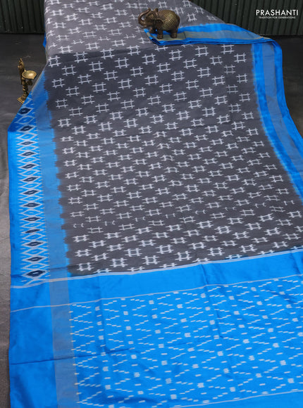Pure pochampally silk saree grey and cs blue with allover ikat weaves and zari woven simple border