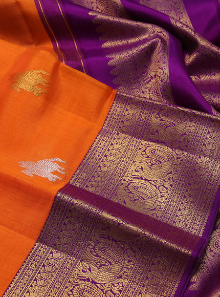 Pure kora kanchipuram silk saree orange and purple with silver & gold zari woven buttas and zari woven border