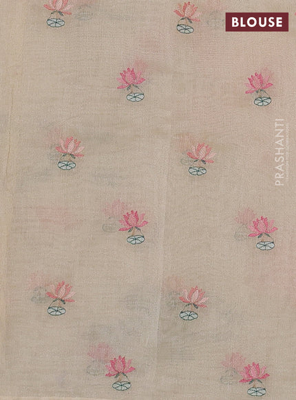 Art tissue chanderi saree cream with allover floral embroidery and lace work border