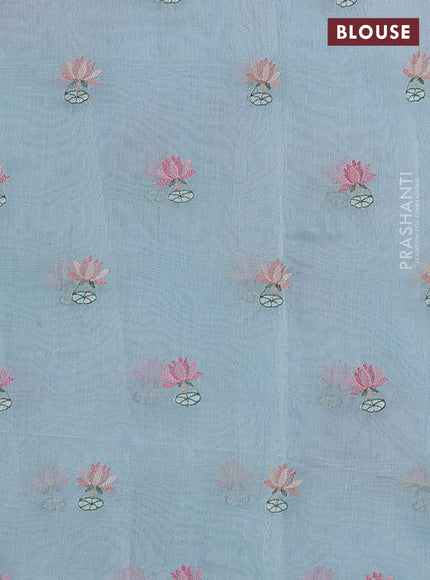 Art tissue chanderi saree light blue with allover floral embroidery and lace work border