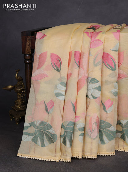 Art tissue chanderi saree pale yellow with allover floral embroidery and lace work border