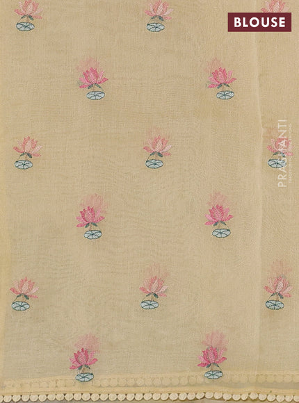Art tissue chanderi saree pale yellow with allover floral embroidery and lace work border