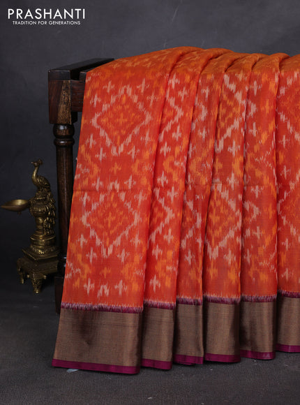 Ikat silk cotton saree orange and dark magenta pink with allover ikat weaves and zari woven border
