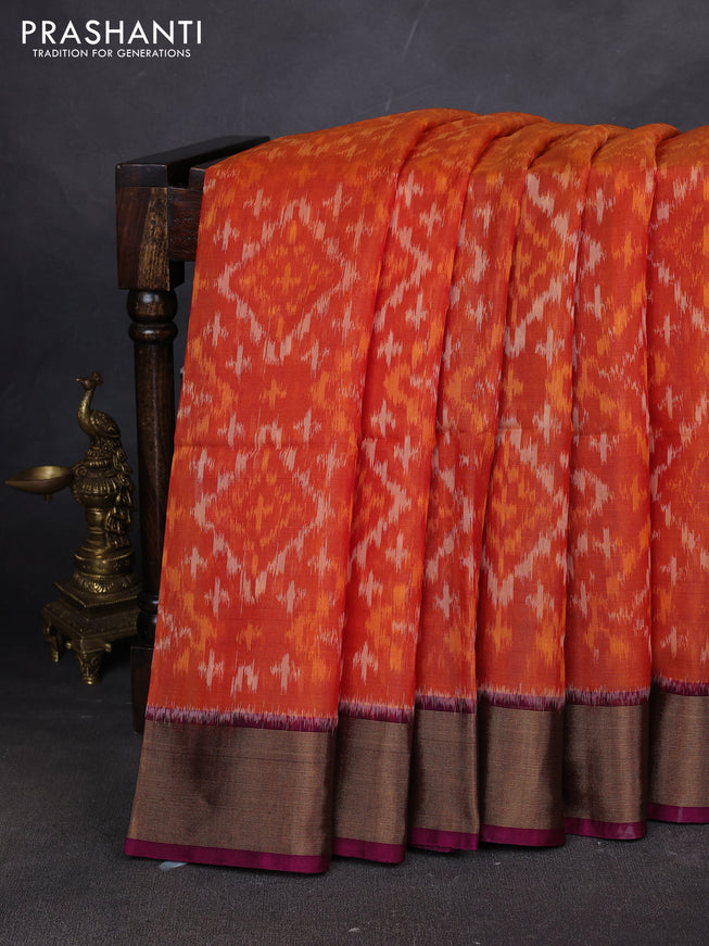 Ikat silk cotton saree orange and dark magenta pink with allover ikat weaves and zari woven border