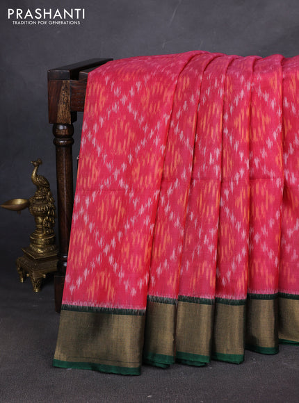 Ikat silk cotton saree pink and green with allover ikat weaves and zari woven border