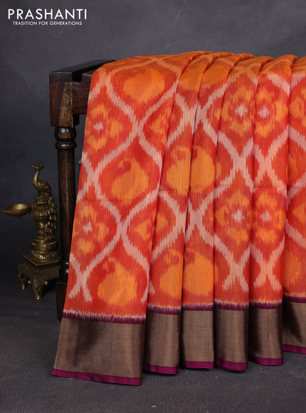 Ikat silk cotton saree orange and dark magenta pink with allover ikat weaves and zari woven border