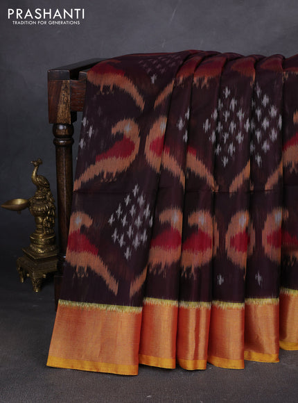 Ikat silk cotton saree deep coffee brown and mustard yellow with allover ikat weaves and zari woven border