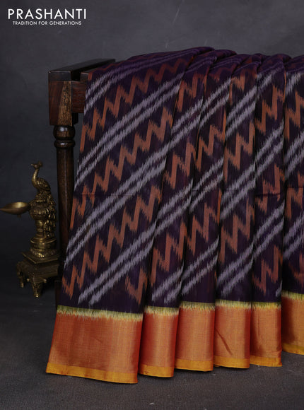 Ikat silk cotton saree navy blue and mustard yellow with allover ikat weaves and zari woven border