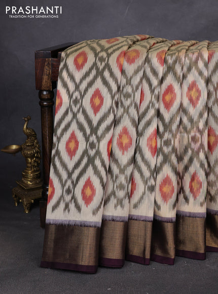 Ikat silk cotton saree cream and deep wine with allover ikat weaves and zari woven border
