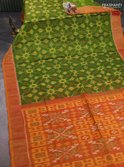 Ikat silk cotton saree light green and sunset orange with allover ikat weaves and zari woven border