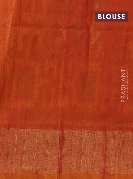 Ikat silk cotton saree light green and sunset orange with allover ikat weaves and zari woven border