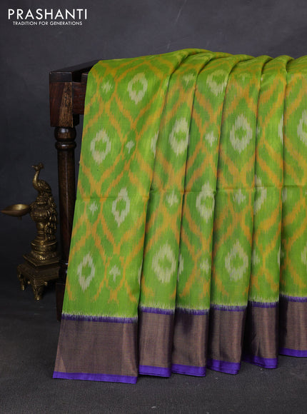 Ikat silk cotton saree light green and blue with allover ikat weaves and zari woven border