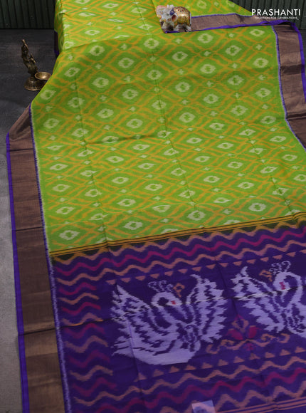 Ikat silk cotton saree light green and blue with allover ikat weaves and zari woven border