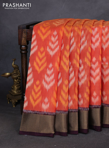 Ikat silk cotton saree orange and deep wine with allover ikat weaves and zari woven border