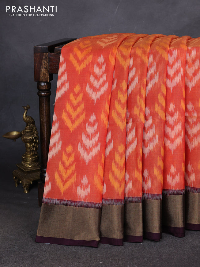 Ikat silk cotton saree orange and deep wine with allover ikat weaves and zari woven border