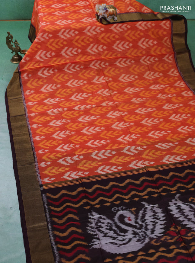 Ikat silk cotton saree orange and deep wine with allover ikat weaves and zari woven border