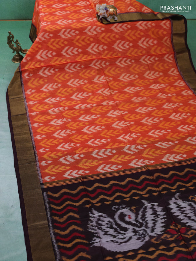 Ikat silk cotton saree orange and deep wine with allover ikat weaves and zari woven border